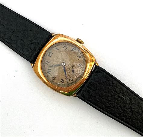 roler gold wrist watch.